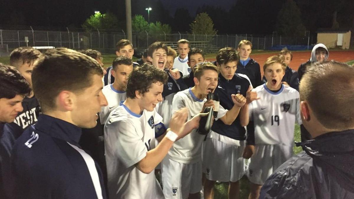 Gig Harbor’s players celebrating after the Tides defeated Squalicum in the opening round of the Class 3A state tournament on Tuesday night, 4-2.