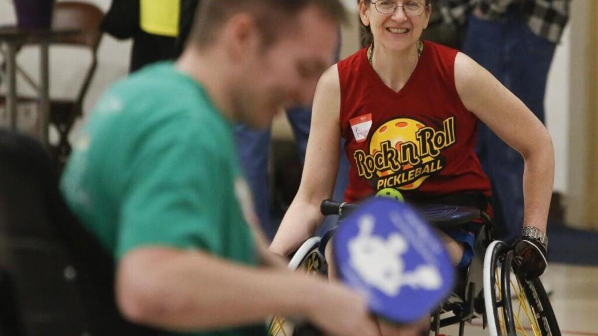 Gig Harbor resident Adrienne Barlow, right, is hoping to get para-pickleball adopted by the Paralympics at some point down the road.