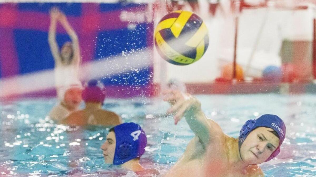 Bryce Denosky practices shooting during Narrows boys water polo team practice at the Gig Harbor High School Pool on Friday.
