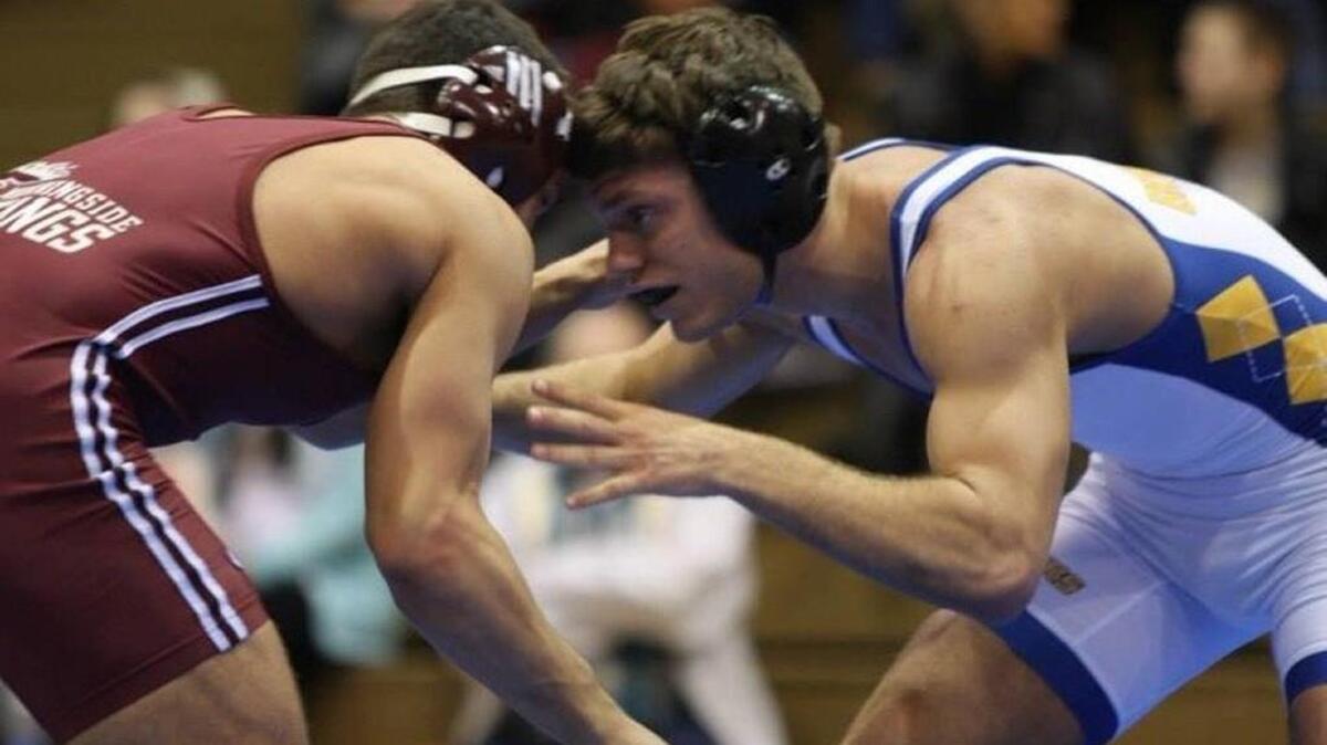 Jacob Spadoni, right, wrestled collegiately for Briar Cliff University in Sioux City, Iowa before graduating in May of 2016. He's now the coach of the Gig Harbor High wrestling team.
