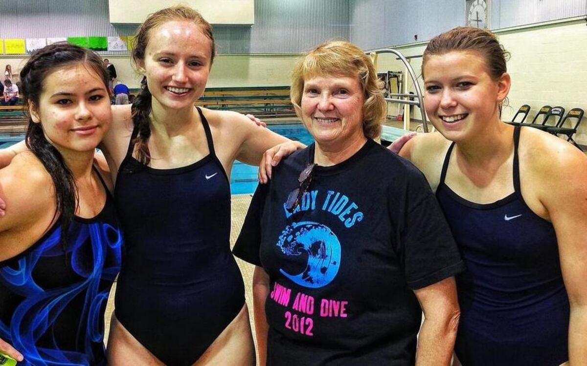 
Liz Litsch, pictured here in 2012 with Gig Harbor divers Heidi Luoung, Michelle Smith and Hannah Christiansen, is being recognized for 30 years of mentorship and coaching in the Peninsula School District. Litsch was diagnosed with panreatic cancer in July.
