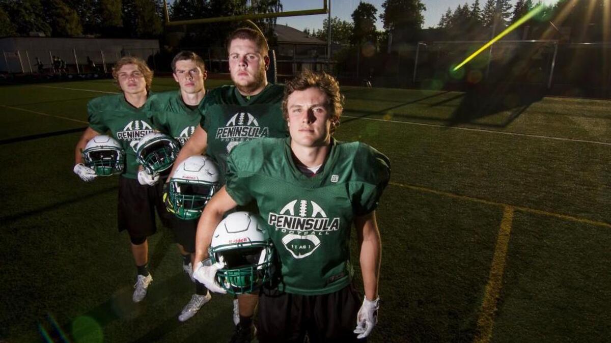Peninsula High players Blake Cantu, Jack Filkins, Cody Kanouse and Evan Johnson, from left, hope to help guide the Seahawks back to their winning ways in 2016.