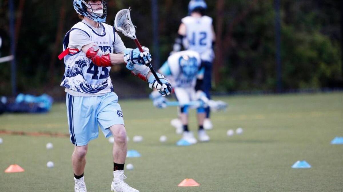 Gig Harbor High senior Elliot Hunter is a “throwback” midfielder who faces off and plays both ways.
