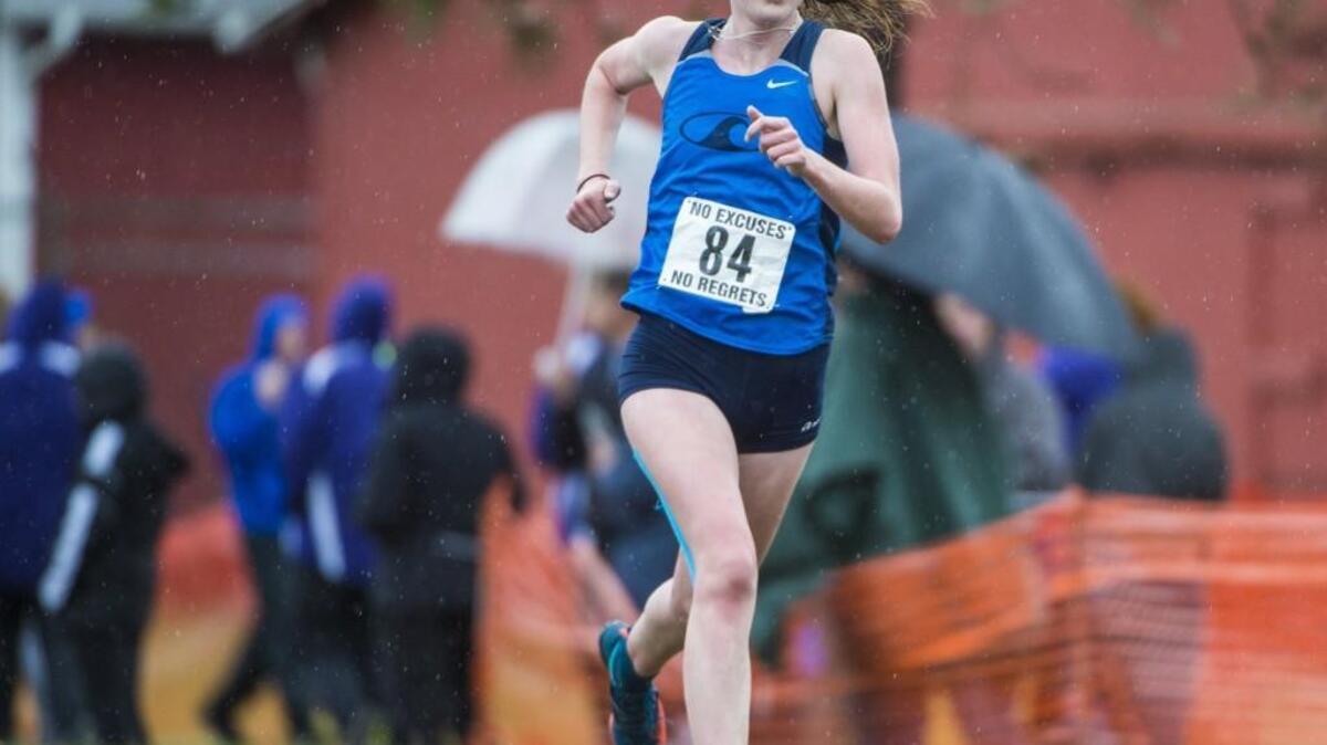 Taryn Donohue finishes the final leg of the race during the Class 3A South Sound Conference championship cross country meet at Fort Steilacoom Park. It was Donohue’s first competitive race in two years, after coming back from a broken leg and a hamstring issue.