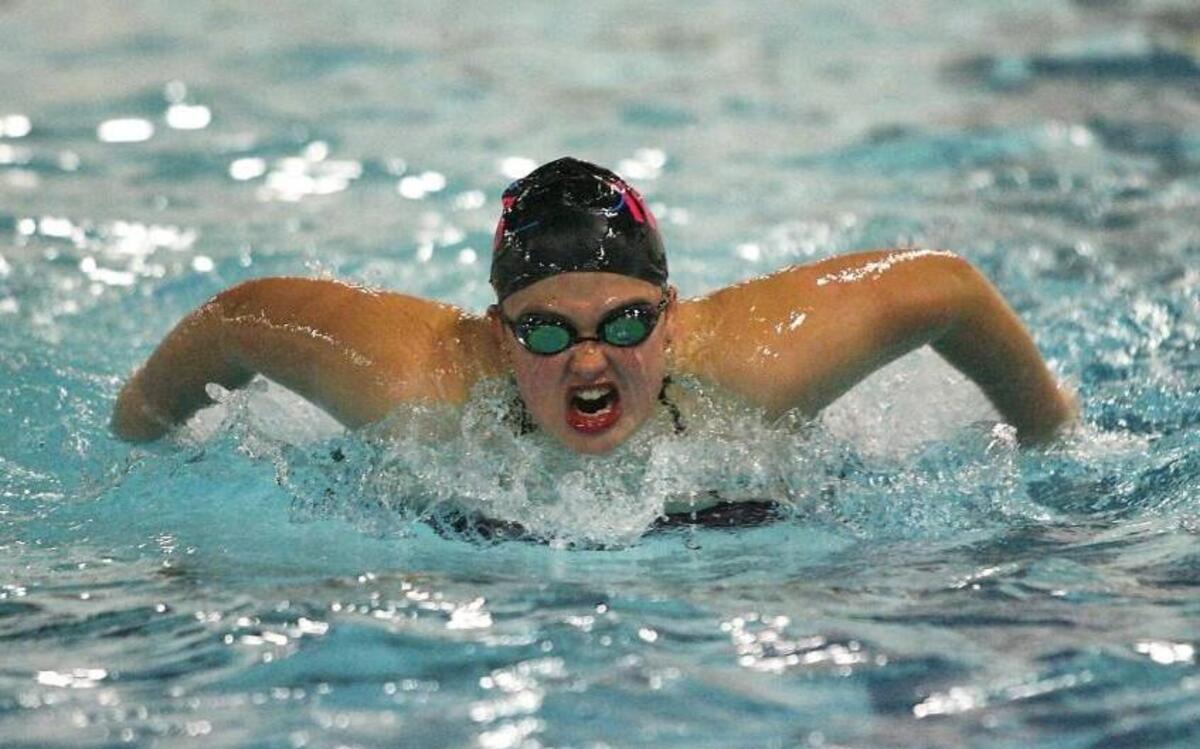 Gig Harbor High freshman Tatum Benson is already a big part of the Tides swim team this season, swimming the butterfly leg of the 200-yard medley relay.
