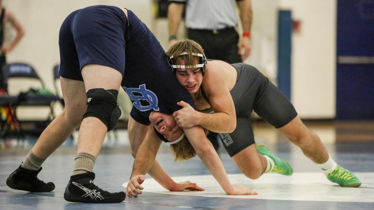 Peninsula’s Keanu Vongsy wrestles Gig Harbor’s Zach Batanian in the 182-pound wrestling match. Peninsula High School played Gig Harbor High School in a wrestling match at Gig Harbor High School in Gig Harbor, Wash., on Thursday, January 12, 2017.