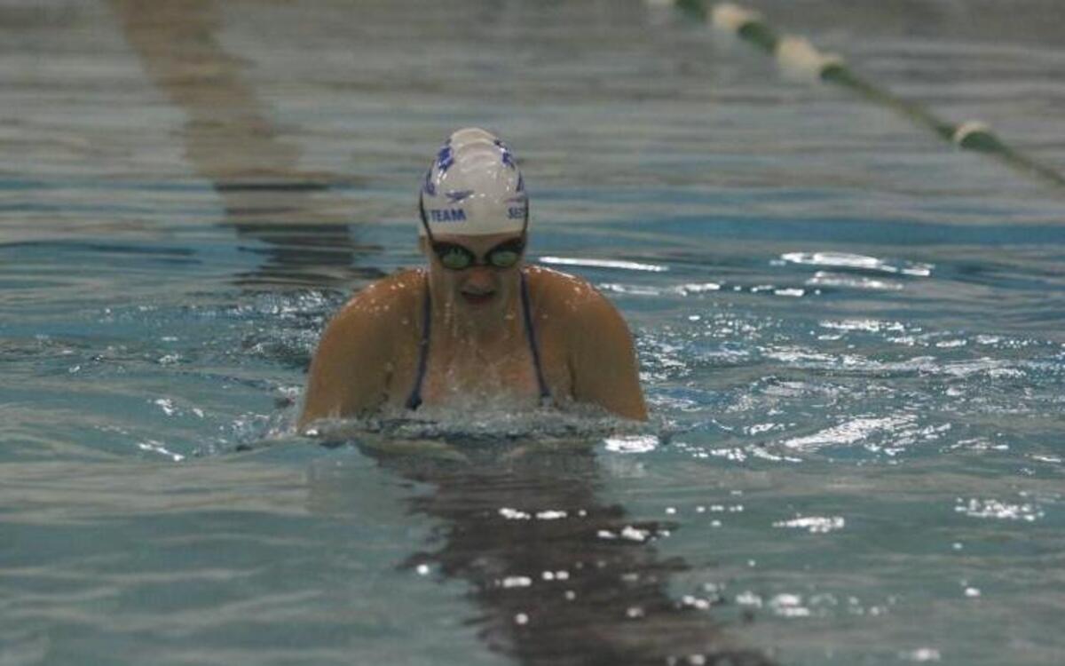 
Peninsula High senior Whitney Mundle, back from a rib injury, hopes to make a splash at this year’s Class 3A state swim meet.
