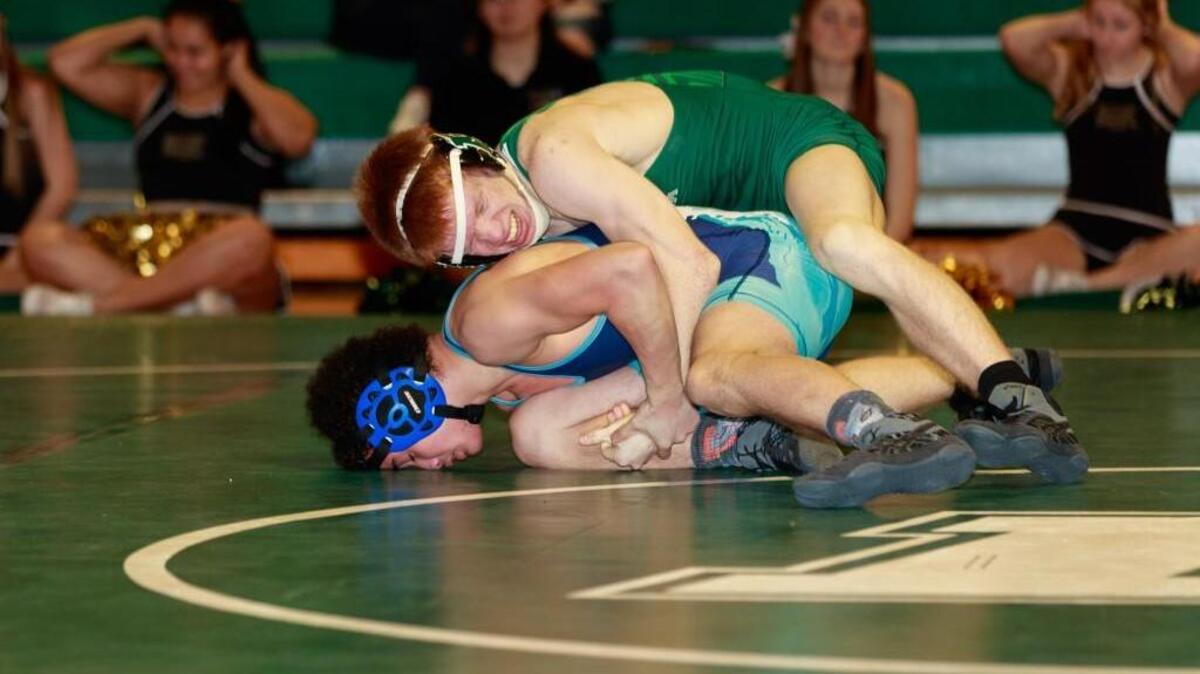 Peninsula's Nathan Johnson, top, attributes his success this season to his improved mental game.