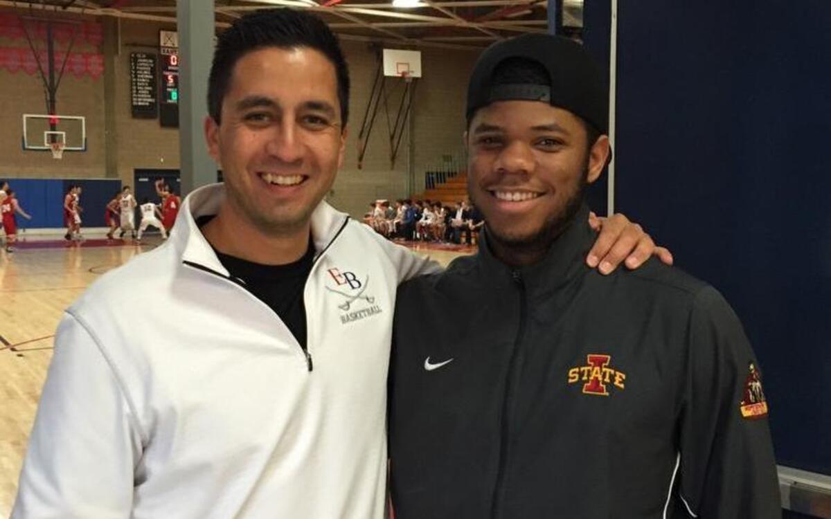 New Peninsula boys basketball coach Matt Robles, left, with his former player, Sheldon Croney Jr., who now plays football at Iowa State University. Robles takes over the Seahawks program after Jake Jackson took the Sumner job.