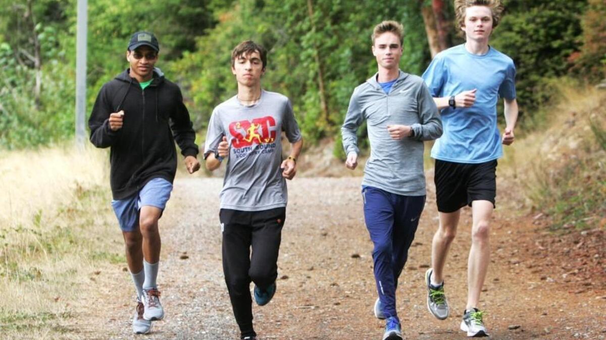 From left, Peter Smith, Bradley Peloquin, Nolan Carroll and Finlay Adamson are gunning for the Class 3A state cross country title this fall.