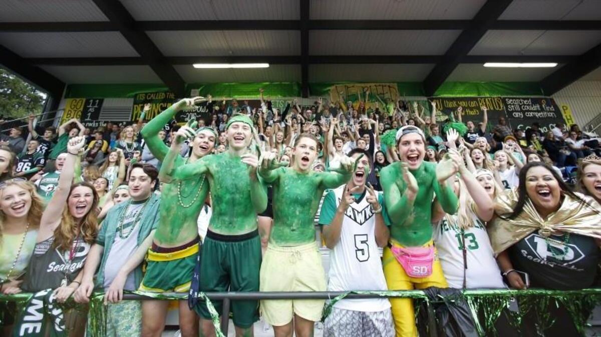 Peninsula Seahawks fans let out a cheer before 2016 Fish Bowl gets going.