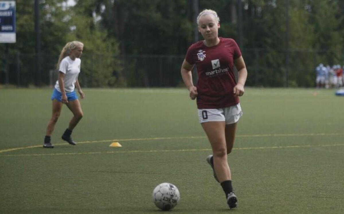 
Gig Harbor junior keeper Erin Harder runs through drills at practice last week.
