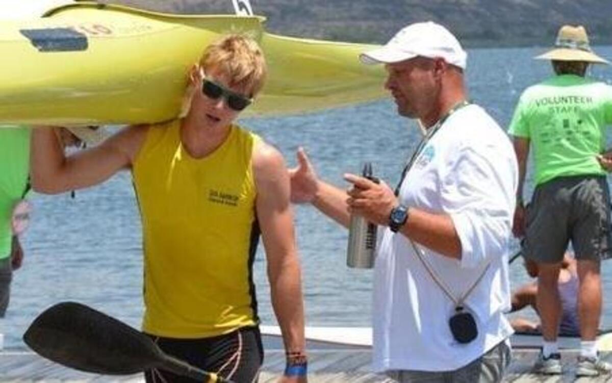 
Kyle Field talks with GHCKRT high-performance coach Holm Schmidt during nationals over the weekend in San Diego.
