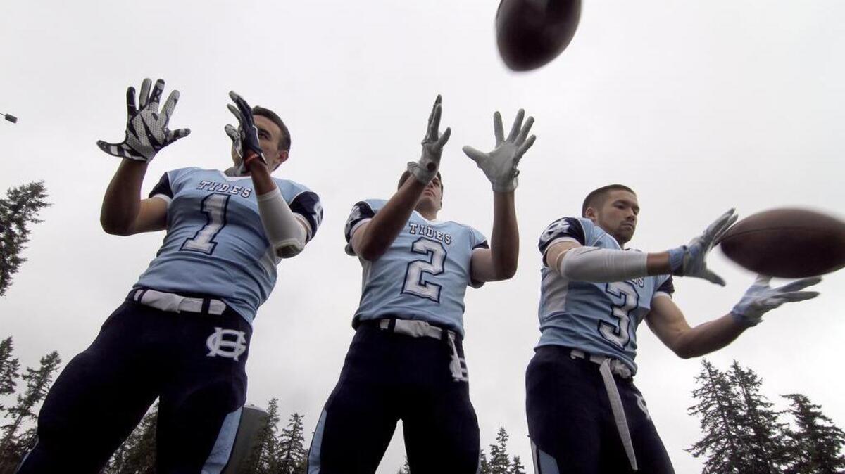 Gig Harbor High wide receivers Kyle Olson-Urbon, left, Cory Condon, center, and Noah Samsen have each piled up more than 500 yards receiving on the season, helping the Tides to a 9-0 record and a 4A Narrows League title.
