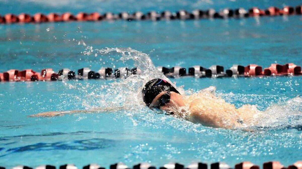 Gig Harbor’s Megan Hanson swims at the Class 3A state meet.