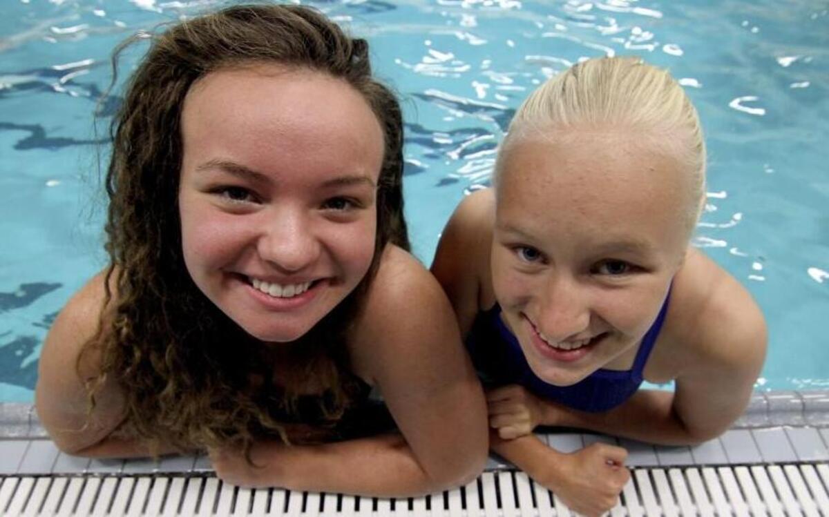 
Gig Harbor High school swim team members and sisters Ursula, left, and Katya Andren, along with brother Max, are all looking forward to the start of the 2015-16 season.
