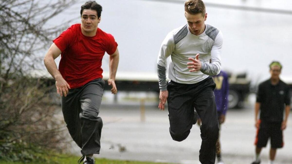 Peninsula junior Ian Collins, right, is off to a blazing-fast start in the sprint events this season.