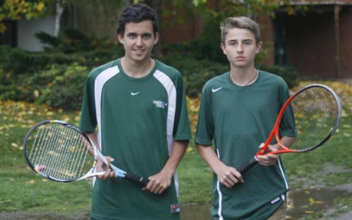 Peninsula High School junior exchange student Fransesc Gallart, left, and sophomore Quinlan Rogers will both be individually representing Peninsula in the West Central District tennis tournament this weekend.