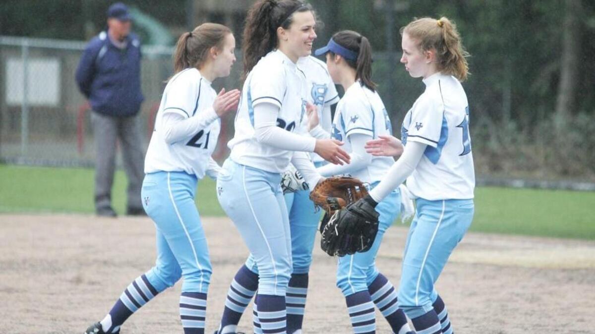 Gig Harbor's team meets at the mound prior to the game's first pitch against Central Kitsap on Monday.