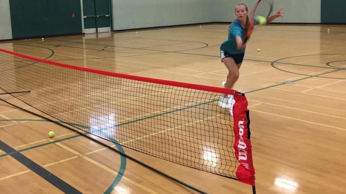 Peninsula junior Sasha Mayer practices indoor on yet another rainy day on Monday afternoon.