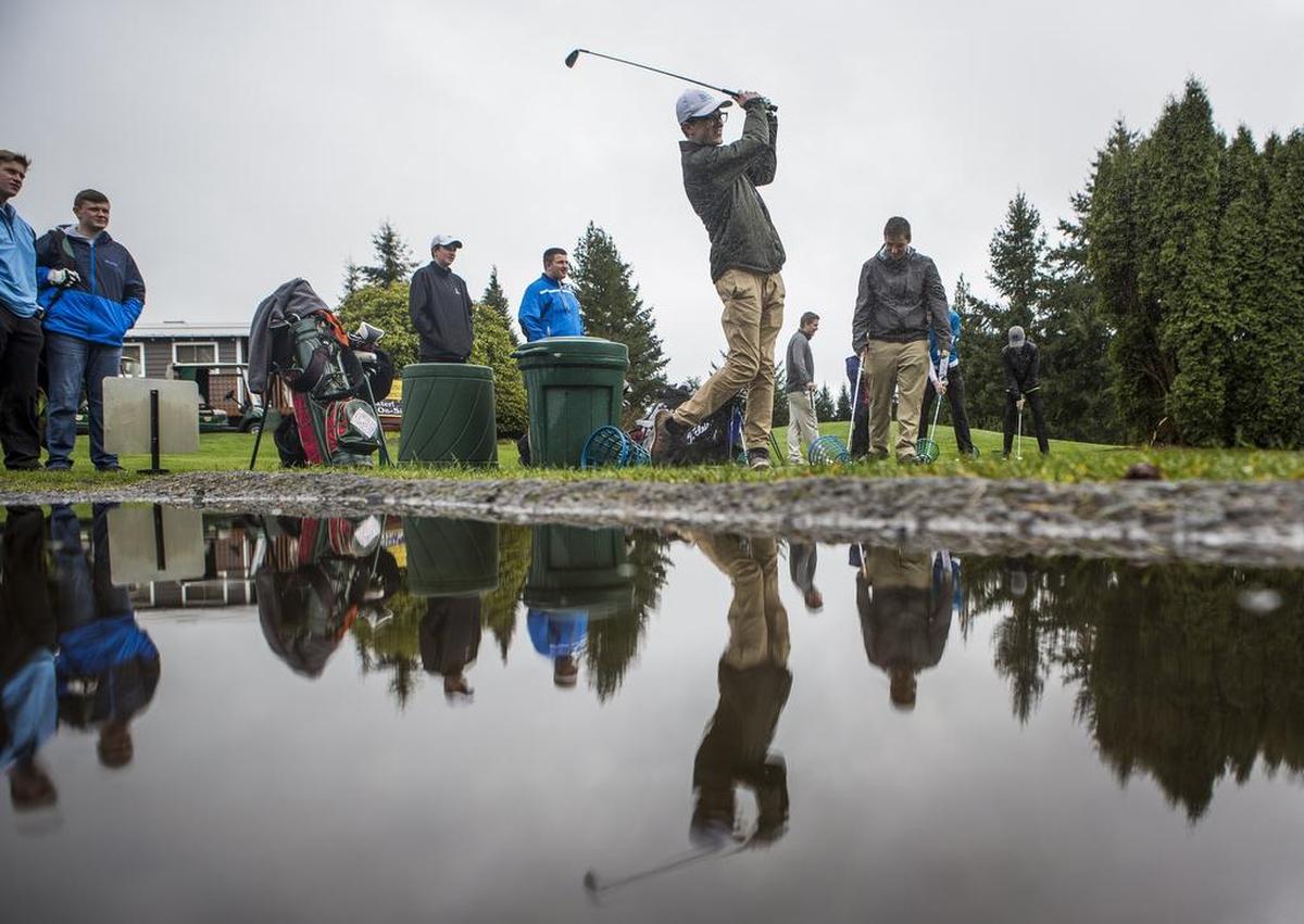 Gig Harbor High golfers practice at Madrona Links in 2017.