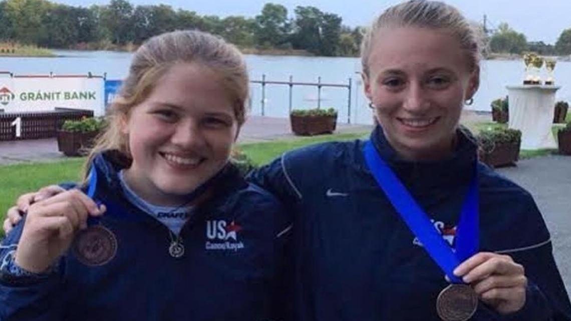 Bronze medalists Olivia Crocker, left, from the Gig Harbor Canoe & Kayak Racing Team, and Andreea Ghizila, from the Cascades Canoe & Kayak Racing Team.