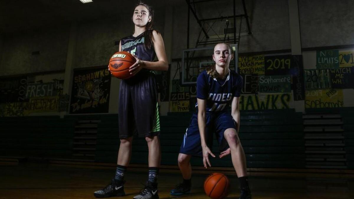 Peninsula’s Belle Frazier, left, and Gig Harbor’s Brynna Maxwell have been teammates since the fourth grade but now find themselves competing on rival high school teams.
