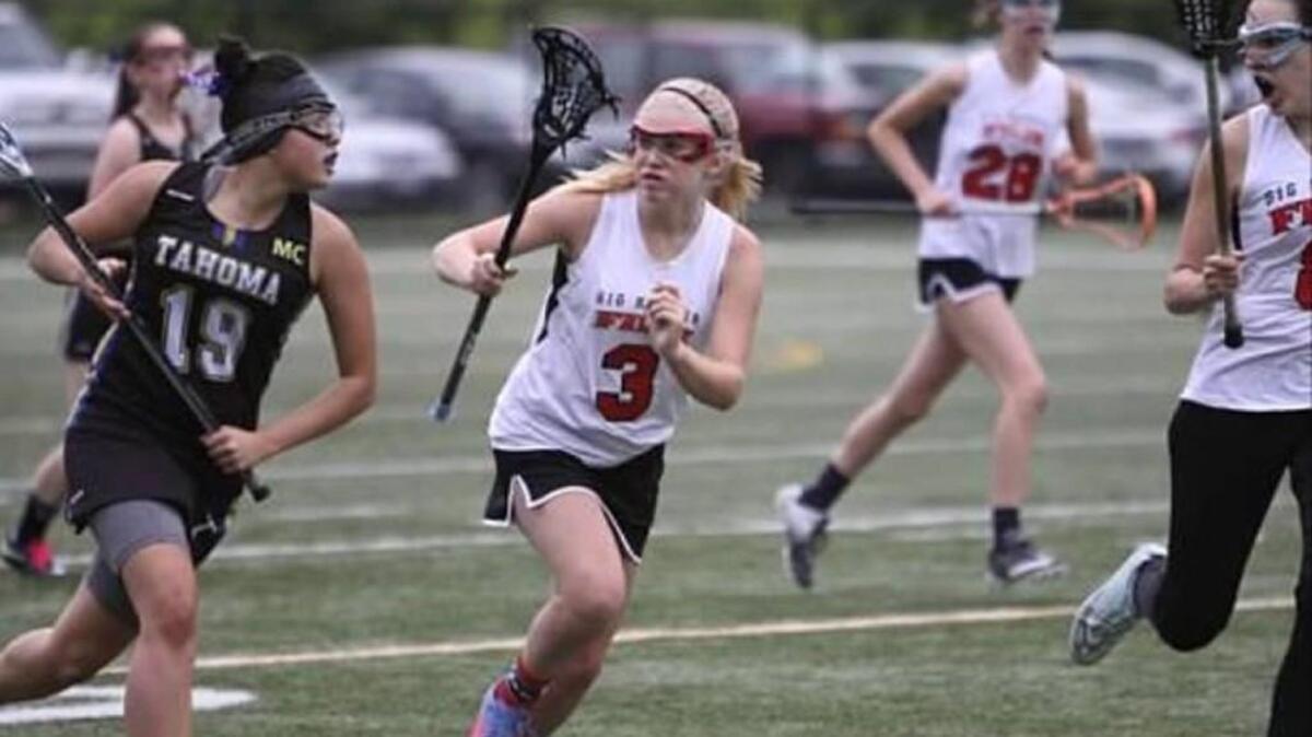 Emily Smokoff, No. 3, applies pressure while playing defense for the Harbor Fire girls lacrosse team. Harbor Fire will begin representing Gig Harbor High School in the spring of 2017.