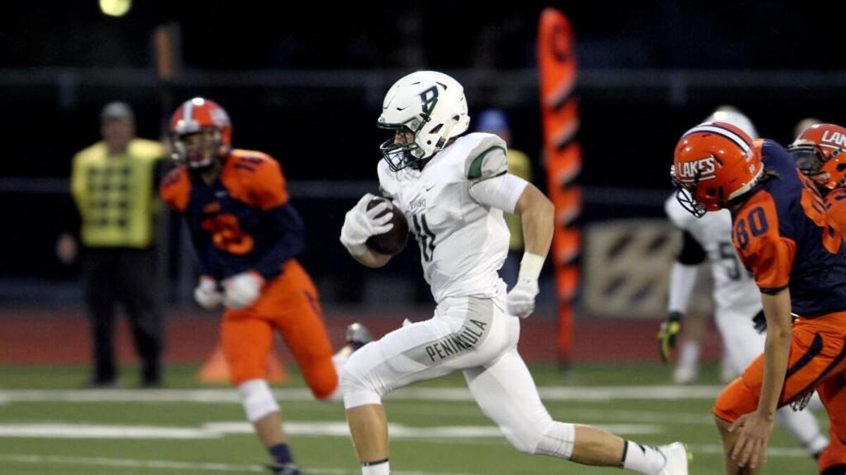 
Running back Evan Johnson returned a kickoff 85 yards for a touchdown in the first quarter against Lakes on Friday.
