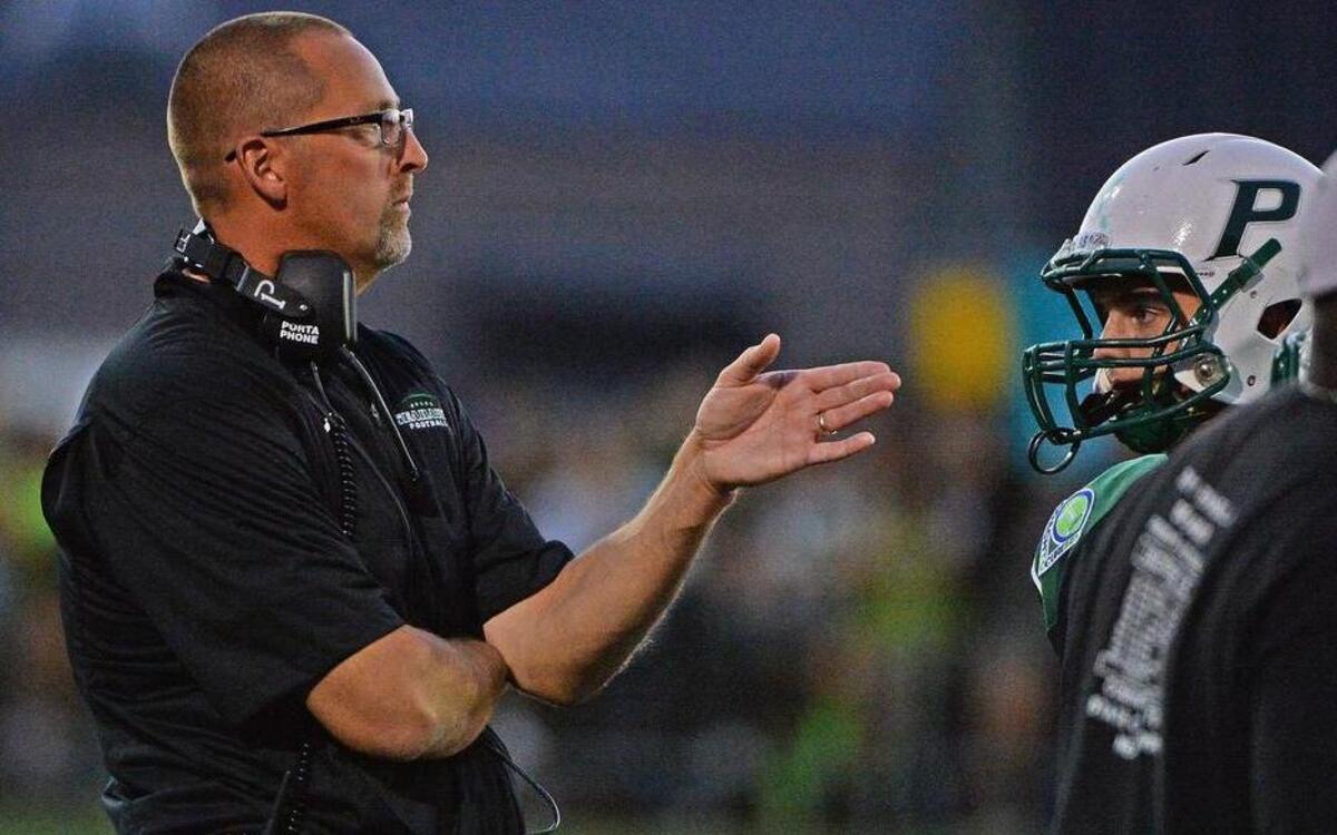 
Peninsula High football coach Ross Filkins gives instructions on the sidelines during the 36th edition of the annual Fish Bowl game at Roy Anderson Field in Purdy. Filkins recently accepted a position as athletic director at the high school. 

