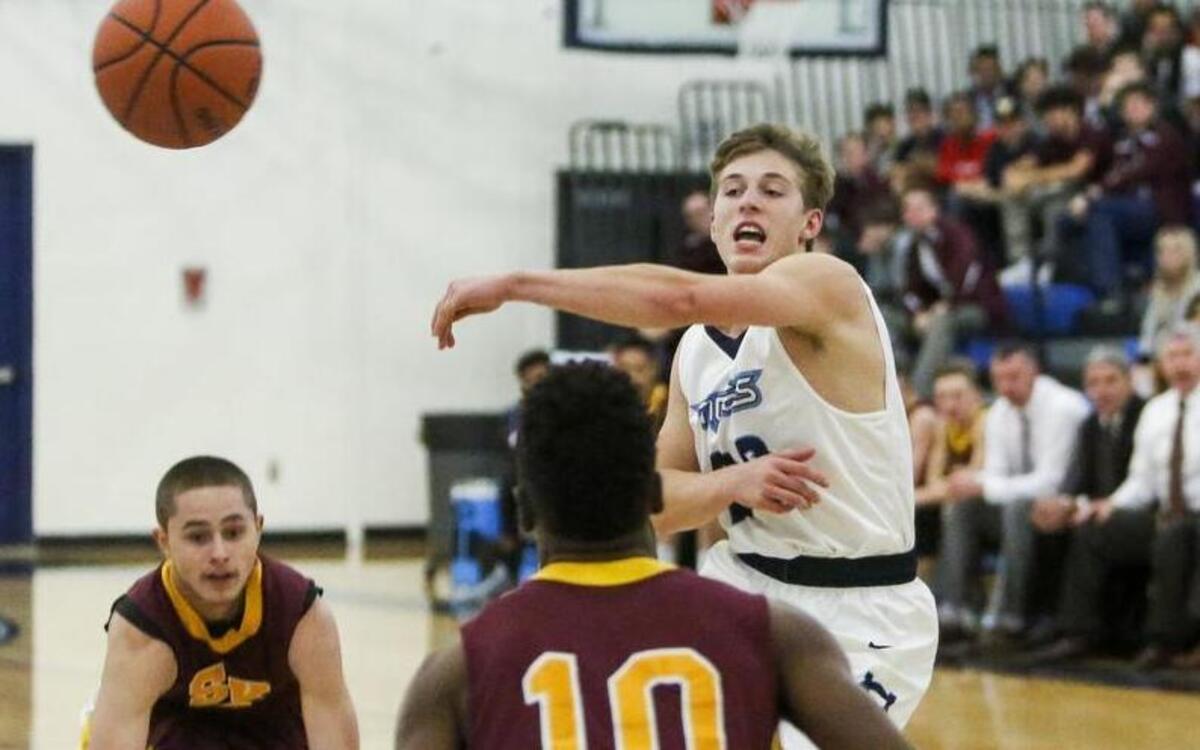 Gig Harbor’s RJ Green (23) passes in the second quarter. Gig Harbor played South Kitsap in a basketball game at Gig Harbor High School in Gig Harbor, Wash., on Wednesday, November 30, 2016.