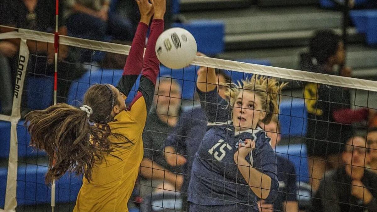 Tides' Hadassah Ward (15) is a matchup problem for opposing defenses with her hard hitting and versatility at the net.