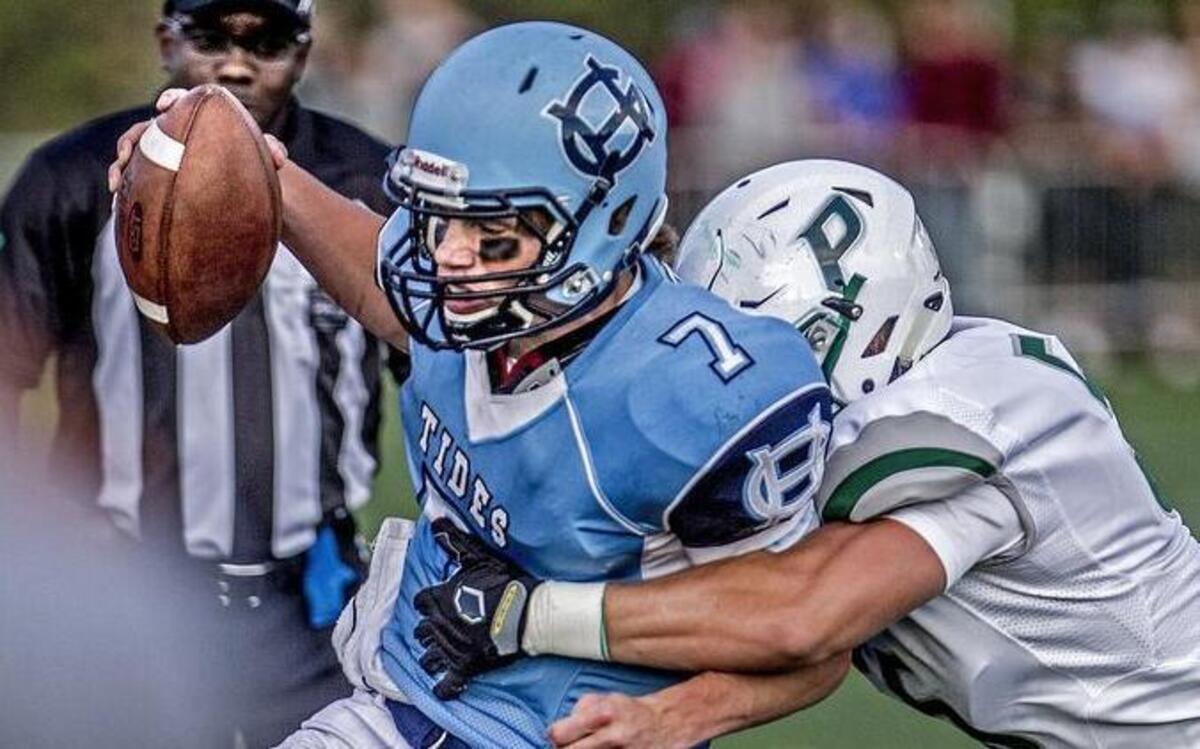 
Gig Harbor’s Davis Alexander (7) is tackled after gaining a first down in the first half by Peninsula’s Kellen Gregory (37) at the 37th edition of the Fishbowl at Roy Anderson Field in Purdy on Friday.
