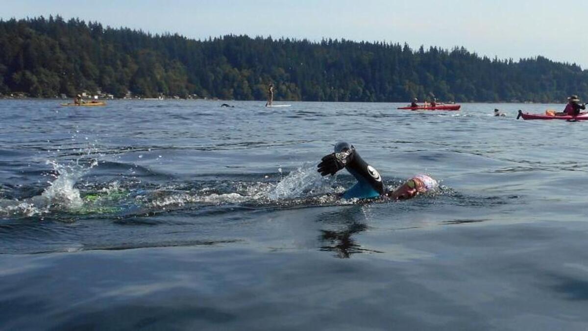 Tesa Johnson is one of three participants to swim in all ten Swim for Fish events, since the event began.