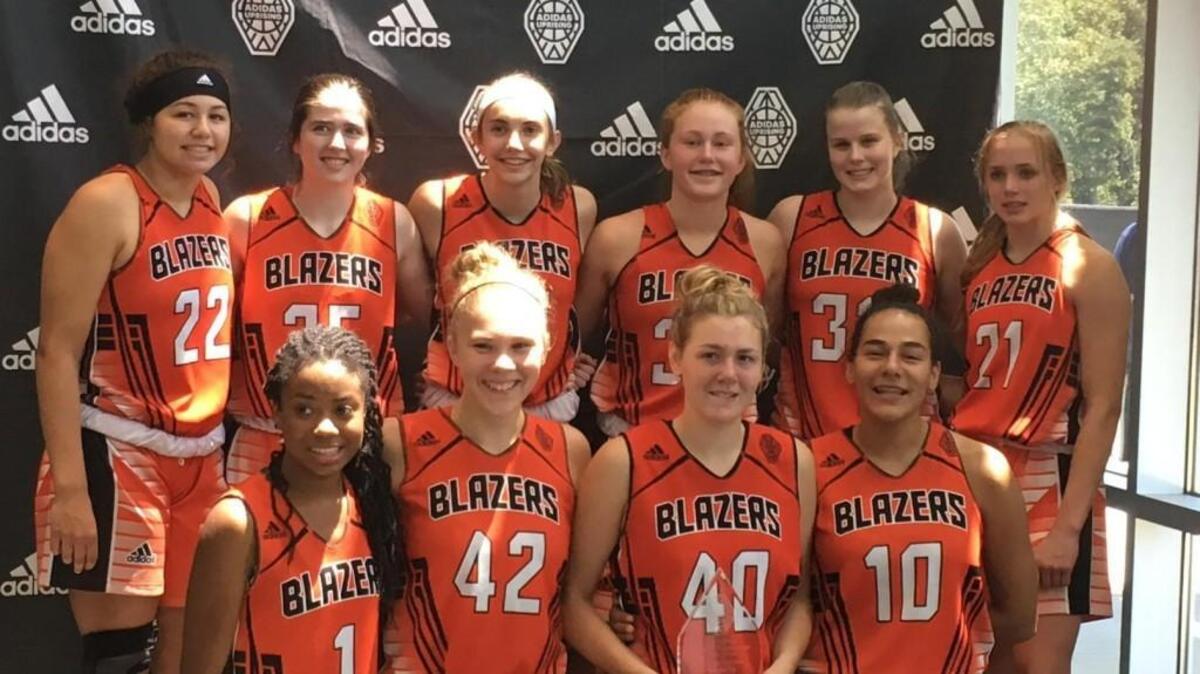 Gig Harbor High School senior Maddie Willett, second from the right on the back row, recently played in the Adidas Uprising national championship game in Atlanta with her AAU team, the Northwest Blazers Orange.