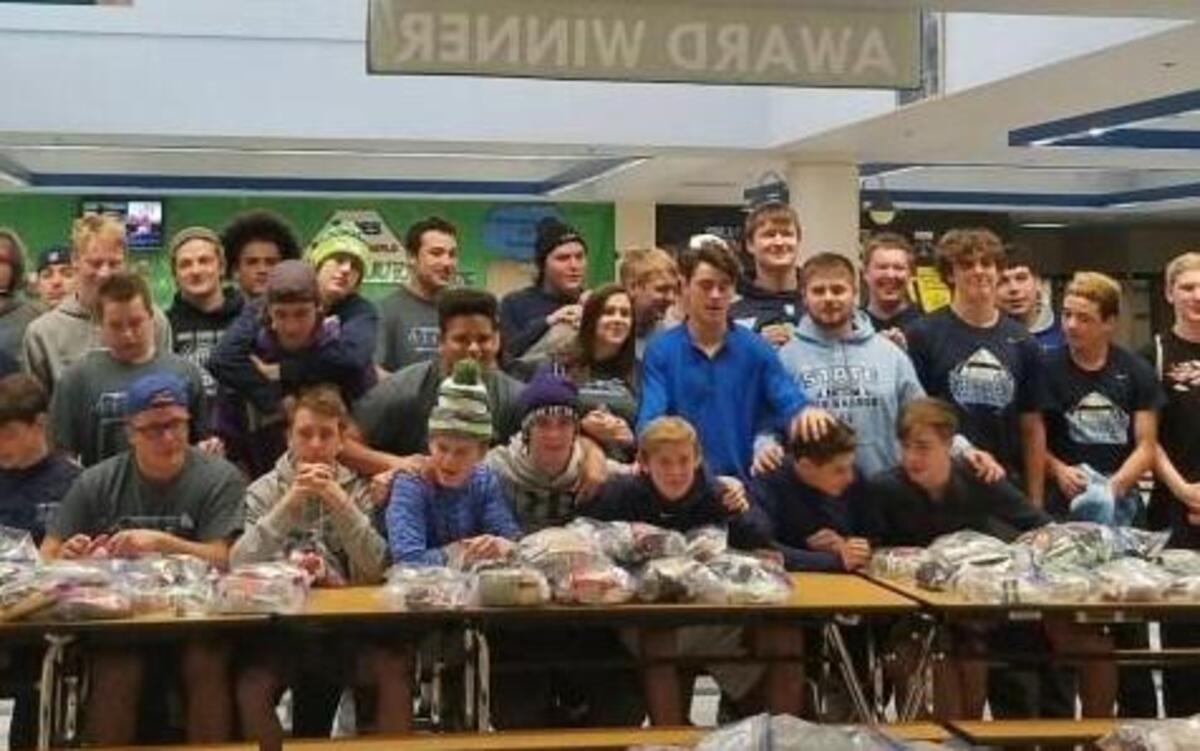 The Gig Harbor football team put together 325 compassion baskets for the needy, 50 bags of toiletries and T-shirts and three Thanksgiving meal baskets.