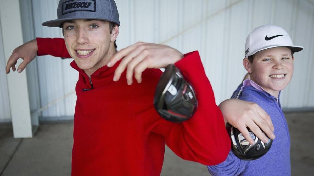 Peninsula High junior Austin Esser, left, and freshman Preston Bebich are two of the top golfers on the Seahawks team.