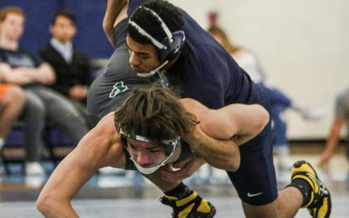 Gig Harbor’s John Bittinger, top, won the Class 3A South Sound Conference 152-pound league title over the weekend, beating Peninsula’s Isaac Casey (not pictured). Bittinger has posted a 20-6 record this season.
