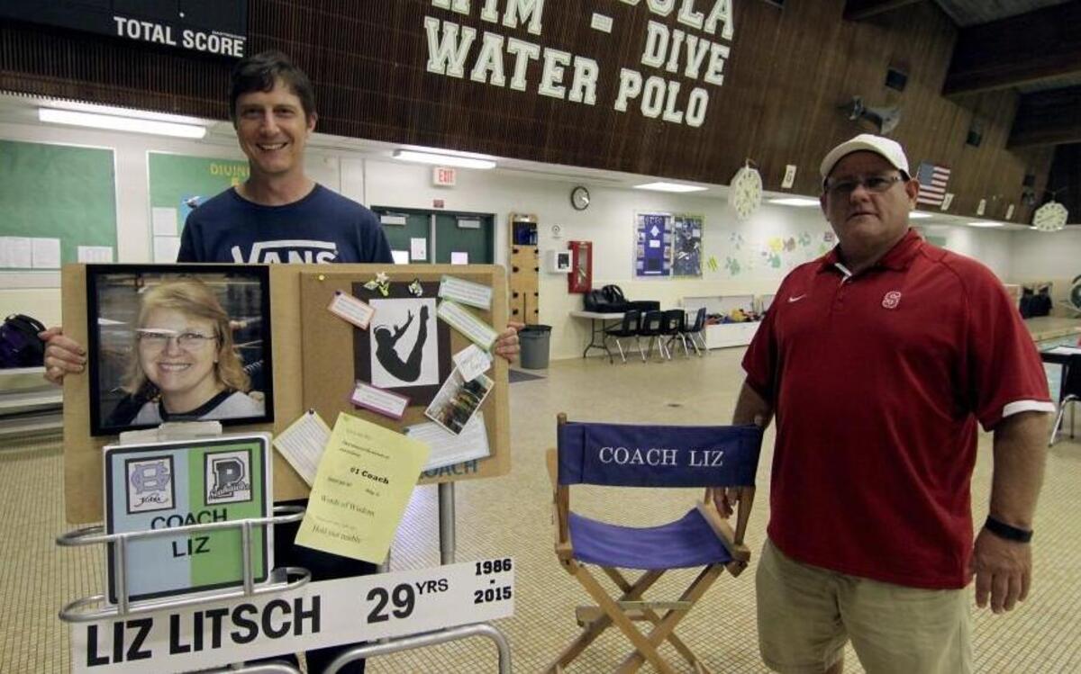 
Former Peninsula High school dive team coach Liz Litsch lost her battle with cancer in September. Her chair and desk that accompanied her to meets and regular practices were being prepared for permanent memorial display at the school’s pool, where she coached for 29 years after having been a team member herself years ago. New dive coach Rob Nichols, left, and swim team coach Craig Brown will continue on with the good work that Litsch had established over her years.
