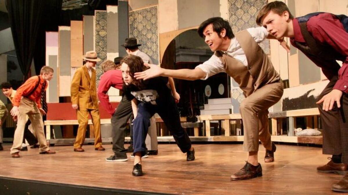 Rehearsing “Guys and Dolls” crapshooters dance, from left, are seniors Sydney Underwood and Trevor Caragan, and sophomore Cameron Showalter.