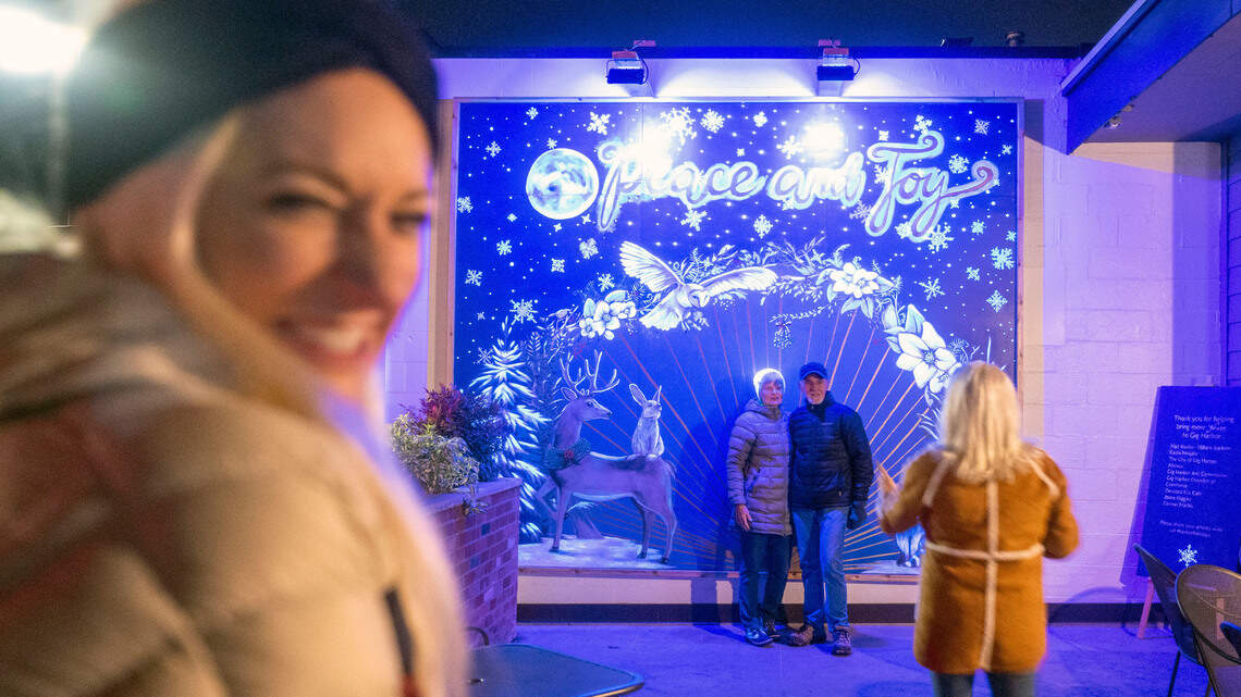 Need a holiday photo? Gig Harbor has a new glow-in-the-dark winter wonderland mural