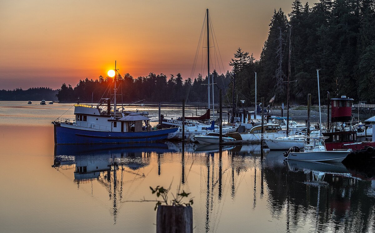 The Lakebay Marina is the only public marina on the Key Peninsula. A red sunrise could be seen over Mayo Cove last year.