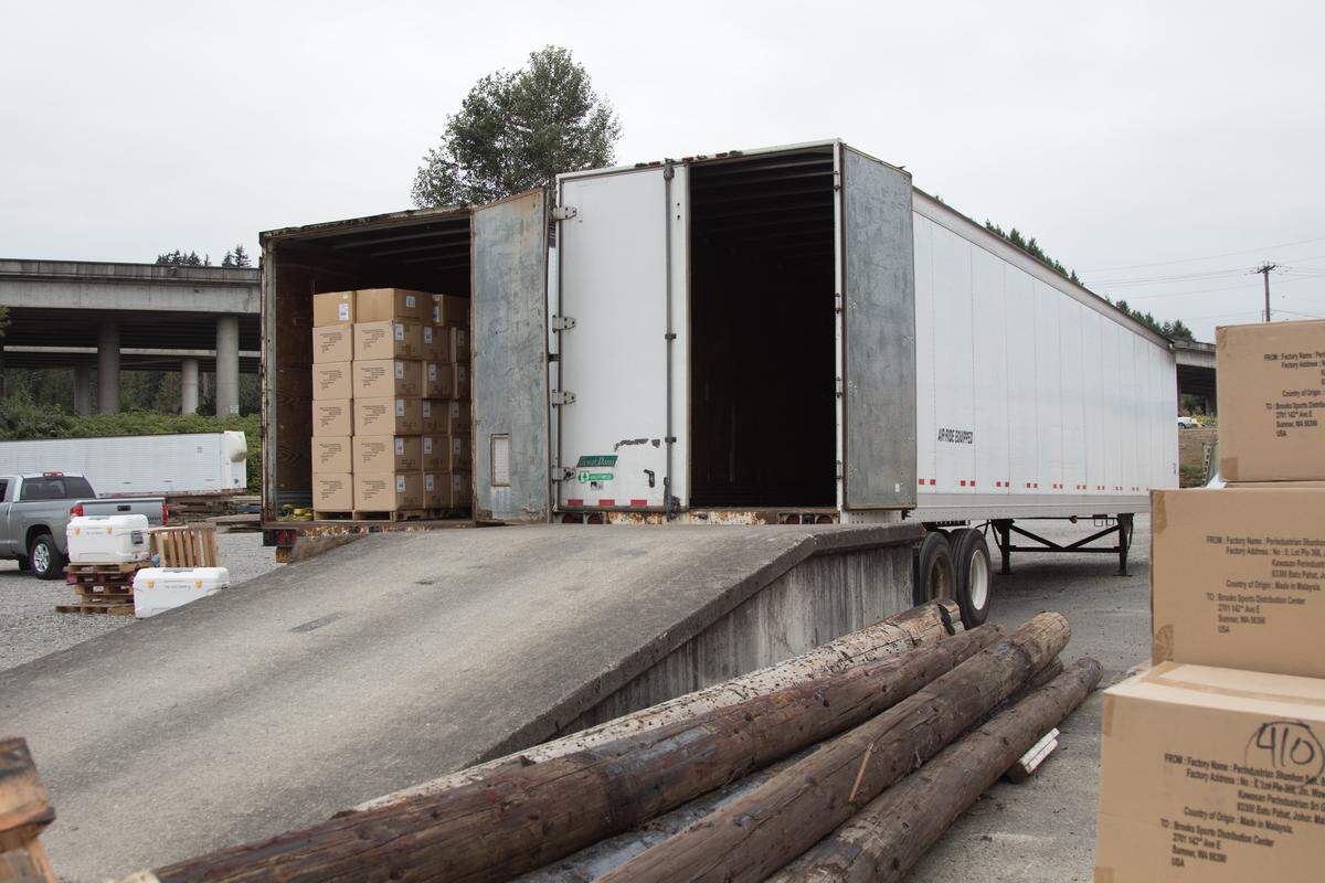 Boxes of shirts, shorts, bags, sports bras and other various items were part of an $850,000 donation made by Sumner’s Brooks Running distribution center in support of local nonprofits. August 2018
