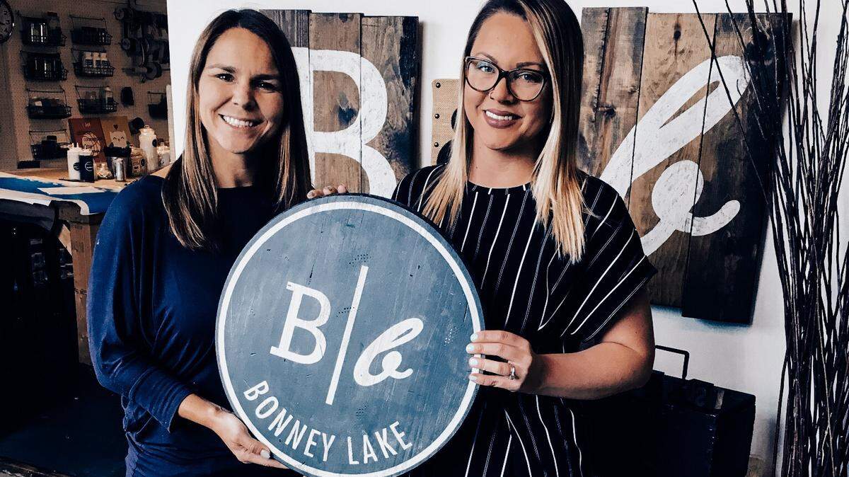 Kim Randolph, left, and Chelsie Dahl are co-owners of the new Board & Brush Creative Studio in Bonney Lake. The studio opens Sept. 7, 2018.