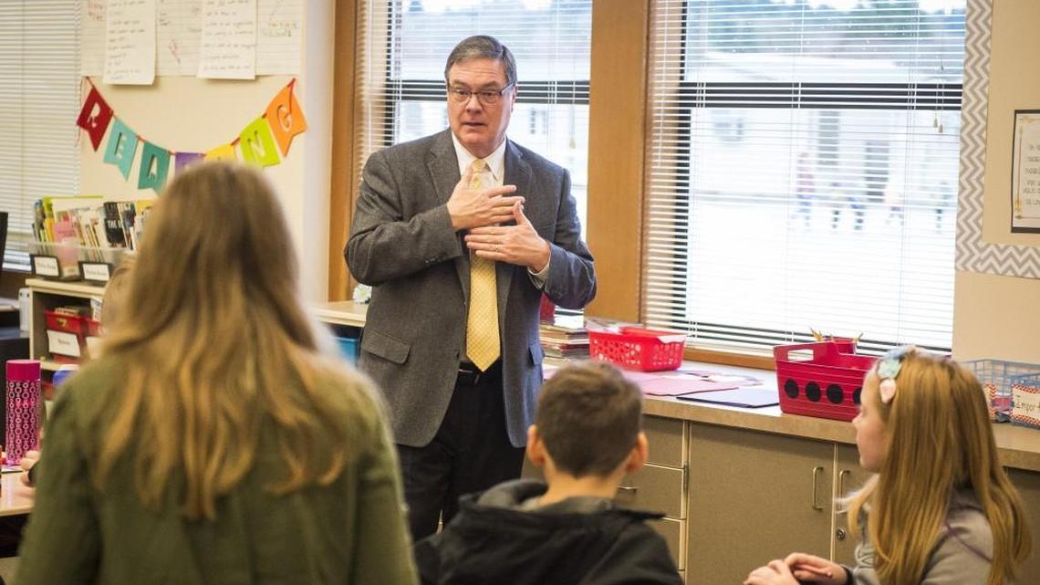 U.S. Rep. Denny Heck discusses how veterans feel when opening greeting cards as he meets fourth grade students at Maplewood Elementary School in Puyallup in February 2018. Heck announced Wednesday he won’t seek re-election.