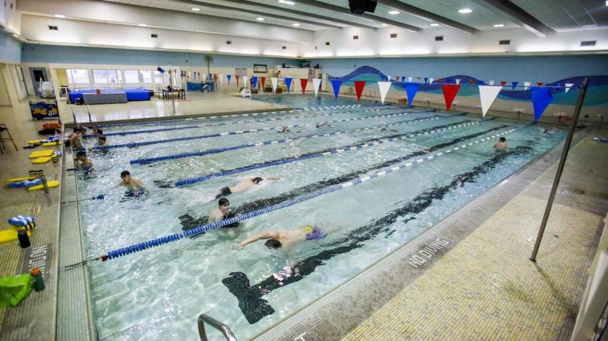 Swimmers with the Sumner swim team swims laps in the pool at Sumner High School in Sumner in 2017.