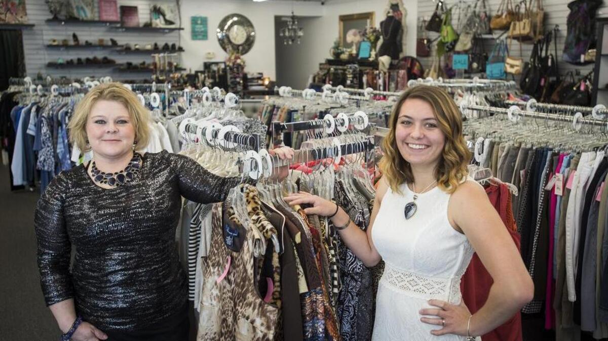 Victoria DeLango, left, and her daughter, Olivia, run Consignment by Victoria at 124 S. Meridian in Puyallup. It opened July 17 and provides women’s clothing, shoes, jewelry and accessories to customers through local consigners.