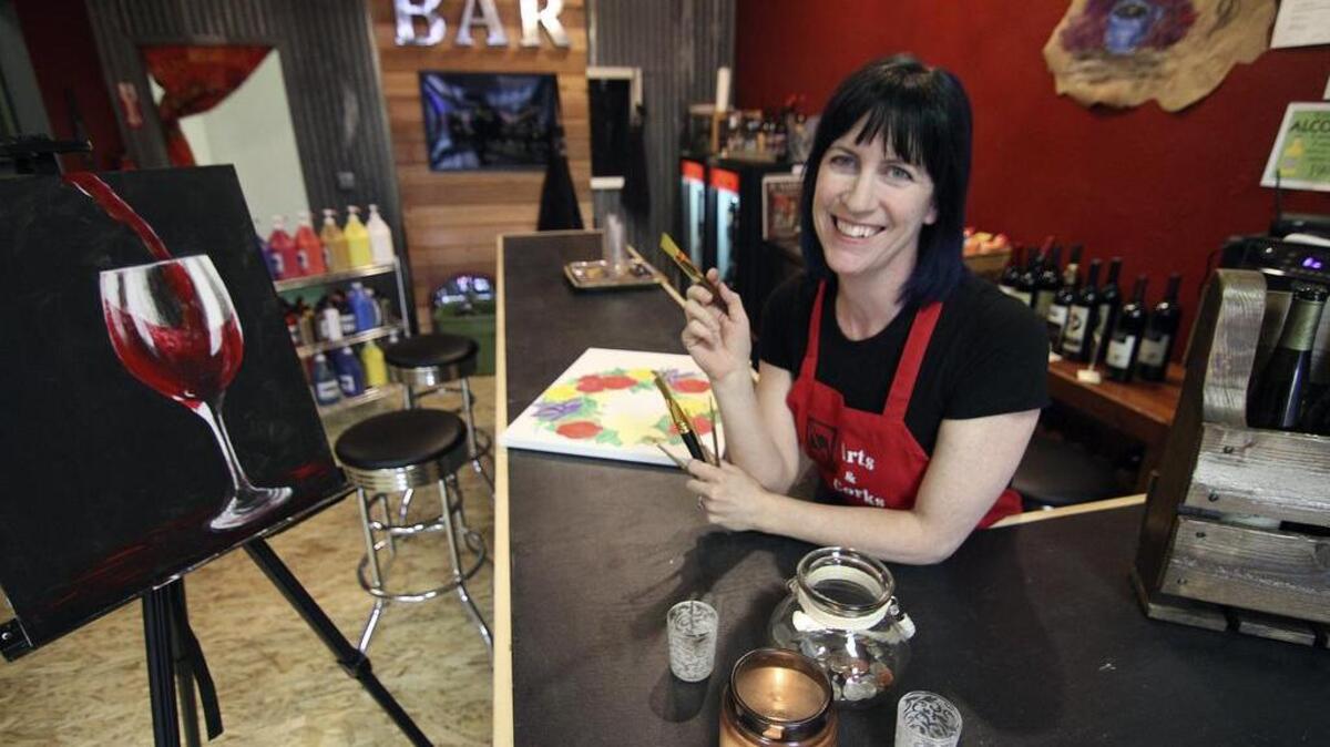 Regina Rollis is the owner and artist behind Arts and Corks, a new wine and painting studio in downtown Puyallup.