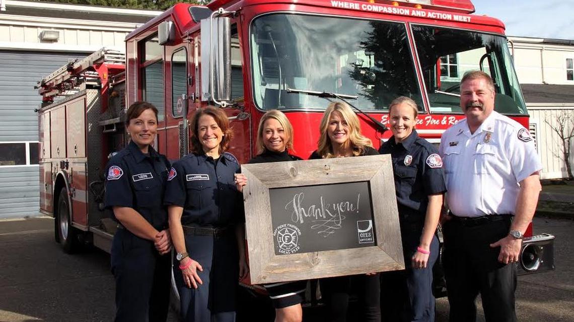 From left, East Pierce firefighter Heidi Rolfsness, firefighter-paramedics Jen Killion and Sara Monzo, Emily Bort of OPES Advisors, East Pierce firefighter-paramedic Erin Richardson and East Pierce Fire Chief Bud Backer celebrate the recent donation to the Carol Milgard Breast Center in Tacoma.