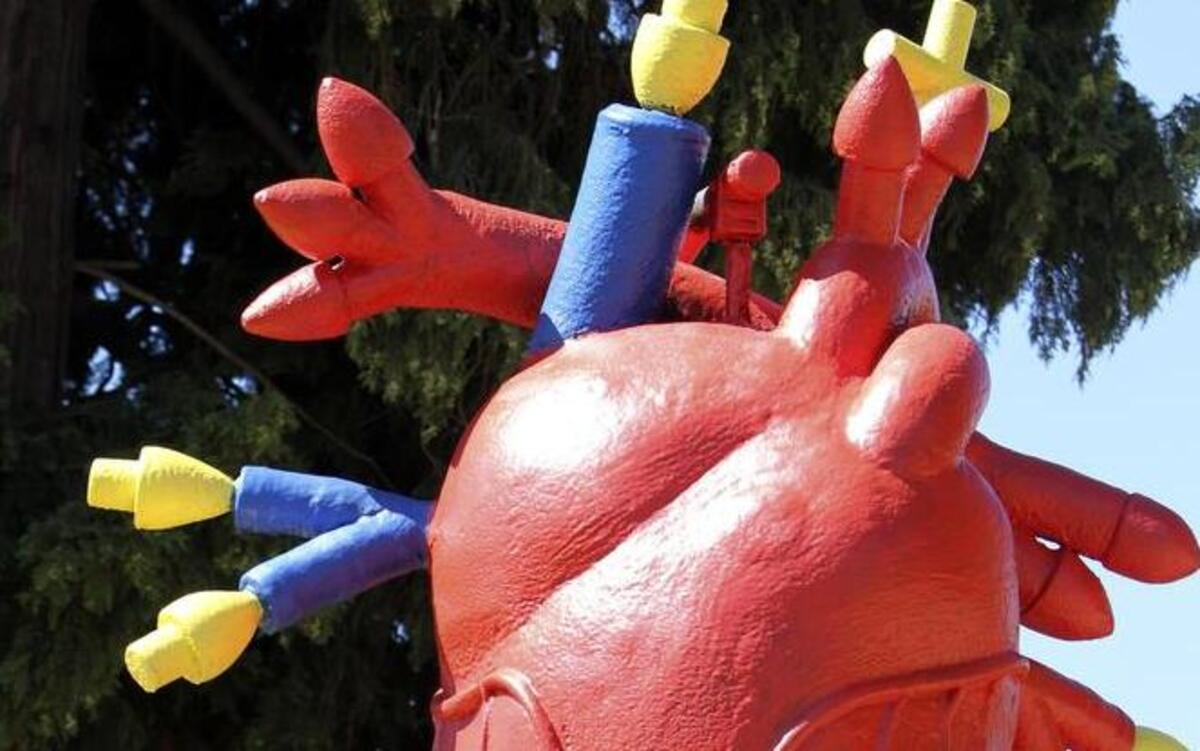 
The “Open Heart” statue, which overlooks the intersection of 5th St. SW and West Pioneer in downtown Puyallup, was recently repainted by its creator, artist Chuck Fitzgerald. 
